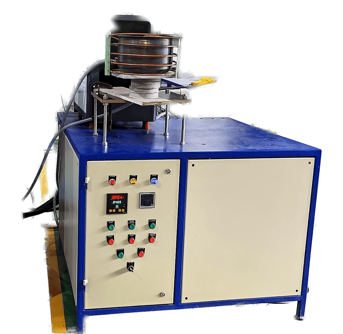 A 60 kW induction heating machine with its coil station and operator controls.
